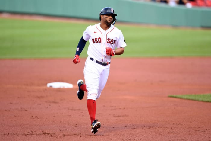 Red Sox shortstop Xander Bogaerts runs the bases after hitting a solo home run against the Astros.